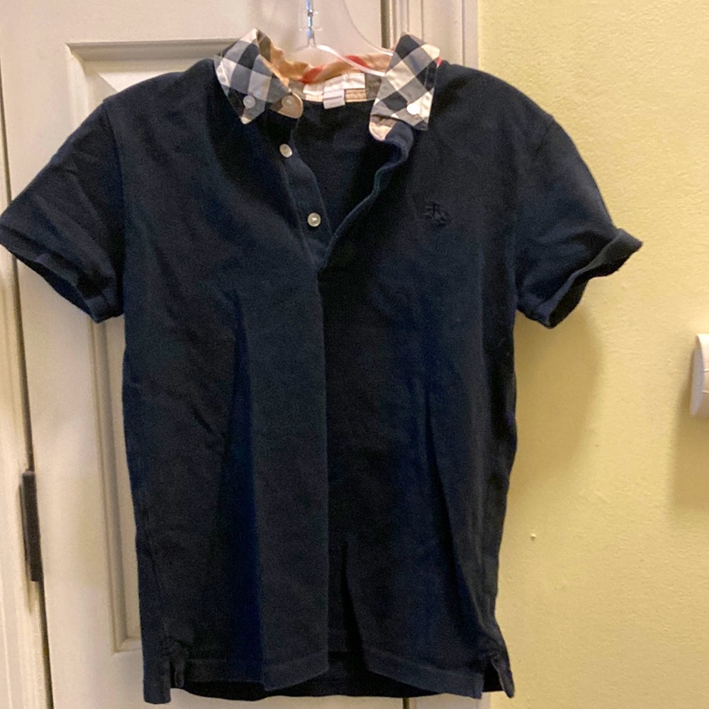 Burberry size 10y blue collared shirt with plaid collar.